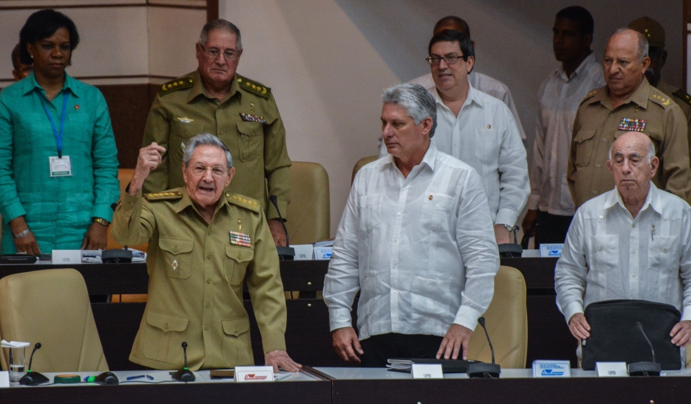 Cuban President Raul Castro, left, speaks next to first vice president Miguel Diaz-Canel, center, and Vice president Jose Ramon Machado Venturas, right, during a special session of the Cuban Parliament to discuss about economic policies in this June 1, 2017  file photo. — AFP