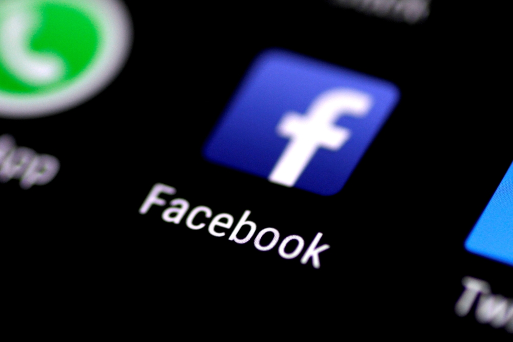 The Facebook application is seen on a phone screen in this file photo. — Reuters
