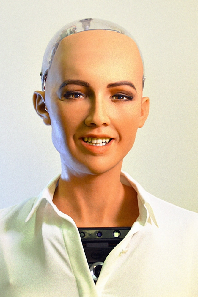 Sophia is Hanson Robotics’ most advanced and celebrated robot endowed with remarkable expressiveness, aesthetics and interactivity. She can simulate a full range of facial expressions, track and recognize faces, look people in the eye, and hold natural conversations with them. Sophia made her debut at the South by Southwest show in March 2016. Since then, she has become a much-sought-after media personality. She has done numerous press interviews, garnering over one billion engagements on a CNBC online coverage. She has also appeared on the most broadly viewed television shows including CBS 60 Minutes with Charlie Rose, the Tonight Show Starring Jimmy Fallon, Good Morning Britain, and has been a keynote speaker, panel member, and meet-and-greeter at some of the world’s most prestigious conferences, and even addressed members of the United Nations General Assembly committee. — SG