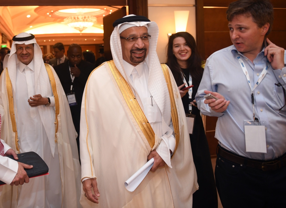 Saudi Energy Minister Khaled Al-Faleh (center) attends a meeting of OPEC and non-OPEC members in Jeddah. — AFP