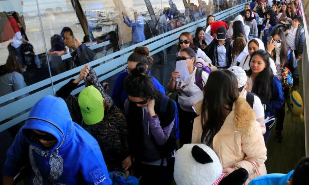 Overseas Filipino workers arriving from Kuwait at Ninoy Aquino Airport in this Feb. 23 file photo.
