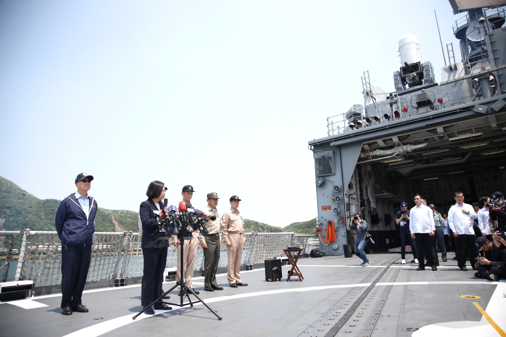 Taiwan President Tsai Ing-wen, second left, speaks to the press at the start of a naval drill in the East China Sea in this April 13, 2018 file photo.  — EPA