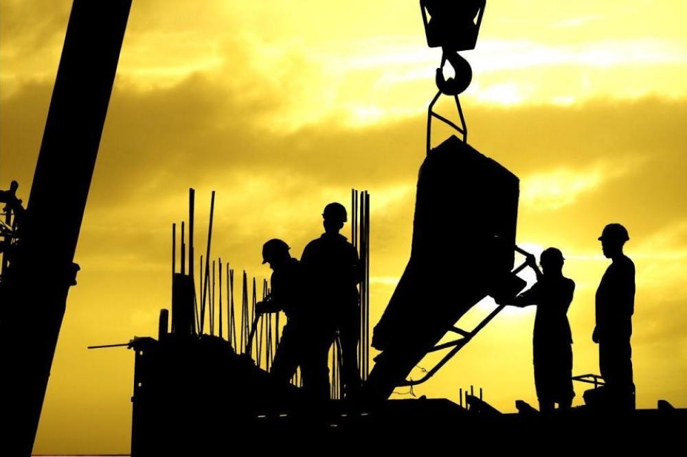 File photo of workers at a construction site.