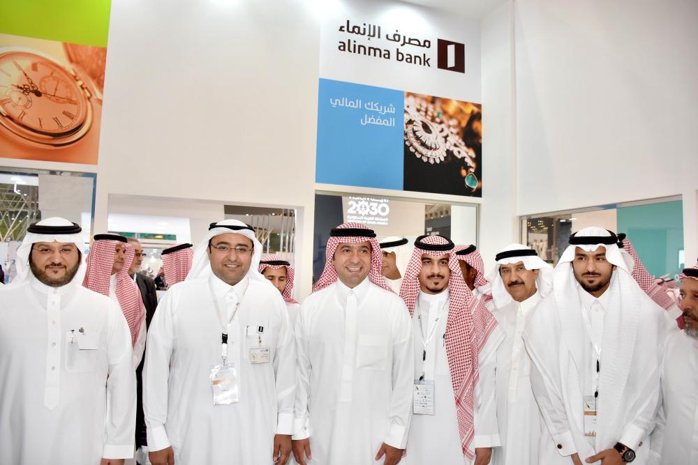 Alinma Bank officials at the Riyadh Real Estate Exhibition 
