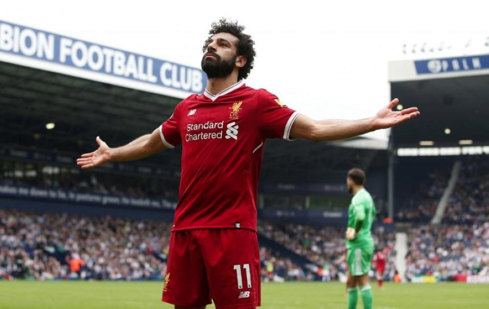 Liverpool's Mohamed Salah celebrates scoring their second goal against West Bromwich Albion in the English Premier League match at the The Hawthorns, West Bromwich, on Saturday. — Reuters  
