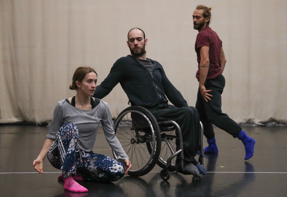 Performers from the Candoco contemporary dance company rehearse their new show in north London. Whether in a wheelchair, on crutches or without any disability at all, performers from the Candoco company are giving London audiences a fresh twist on contemporary dance. - AFP