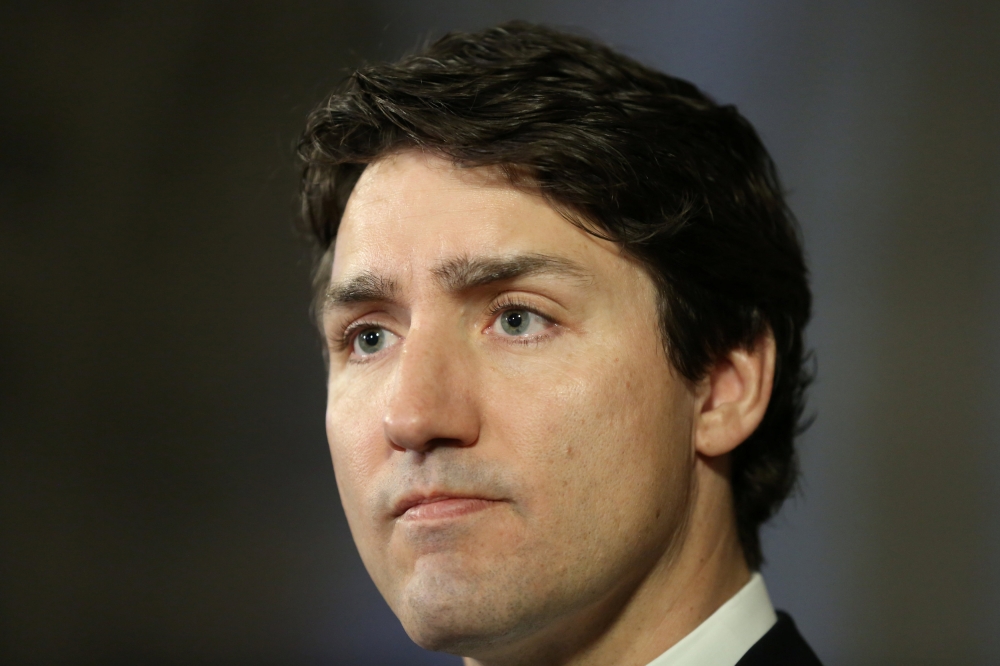 Canada’s Prime Minister Justin Trudeau listens to a question while speaking about an incident where a van struck multiple people in Toronto, on Parliament Hill in Ottawa, Ontario, on Tuesday. — Reuters