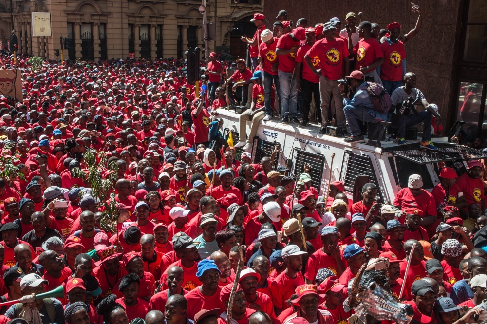 Demonstrators take part in a national strike called by South African Federation of Trade Unions SAFTU against a government proposed minimum wage in Johannesburg on Wednesday. — AFP