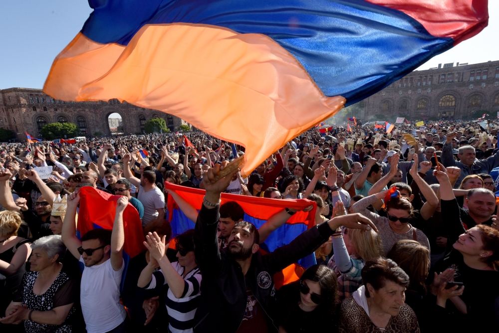Armenian opposition supporters take part in a rally in Yerevan on Wednesday. — AFP