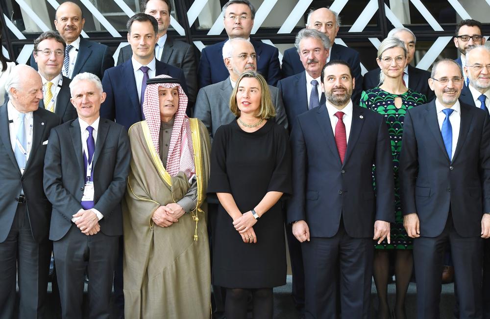 

(1st row LtoR) United Nations Special Envoy for Syria Staffan de Mistura, UN Under-Secretary General for Humanitarian and Affairs and Emergency Relief Coordinator Mark Lowcock, Saudi Arabia Foreign Minister Adel Al-Jubeir, European Union Foreign policy chief Federica Mogherini, Lebanon’s Prime Minister Saad Hariri, and Jordan’s Foreign Minister Ayman Al-Safadi pose for a family photo during a conference on “Supporting the future of Syria and the region”at the European Council in Brussels on Wednesday. — AFP