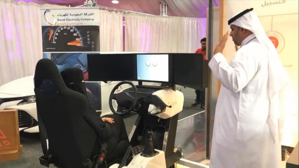 Saudi women learn road safety measures ahead of driving license procedures. Those attending the forum also learned how to drive through using a virtual car simulator. — Courtesy photo
