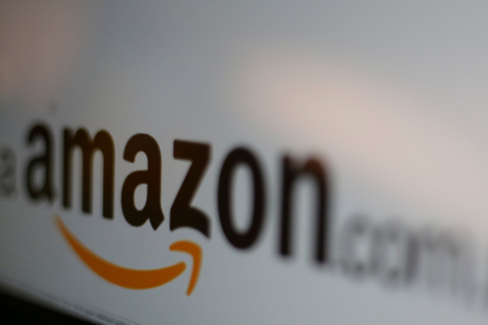 The logo of the web service Amazon is pictured in this June 8, 2017 illustration photo. — Reuters