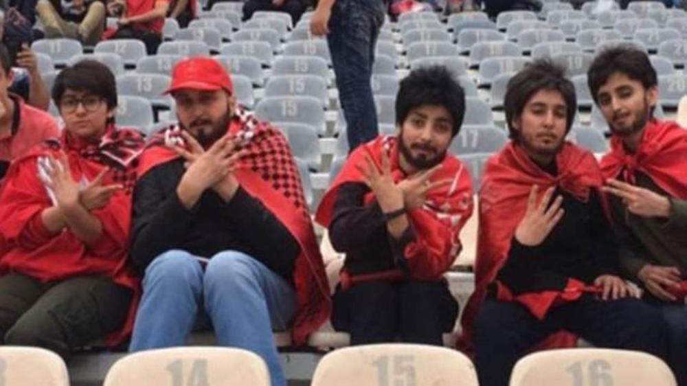 Photos and video of the fans sitting in Tehran's Azadi Stadium disguised as men as they watched their team Persepolis crowned champions on Friday have gone viral on social media.