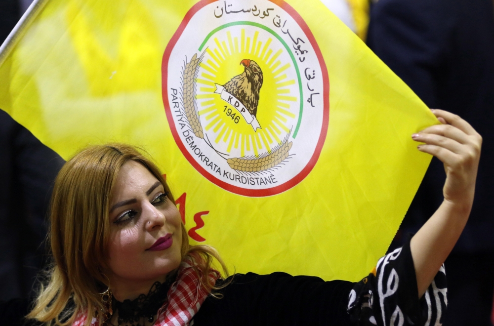 An Iraqi Kurd attends an electoral rally for the Kurdistan Democratic Party (KDP) in Irbil, the capital of the northern Iraqi Kurdish autonomous region. — AFP