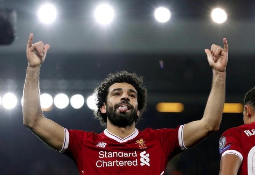 Liverpool's Mohamed Salah celebrates scoring a goal in this file photo. — Reuters