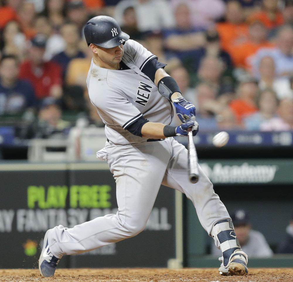 New York Yankees Gary Sanchez hits a three-run home run during the