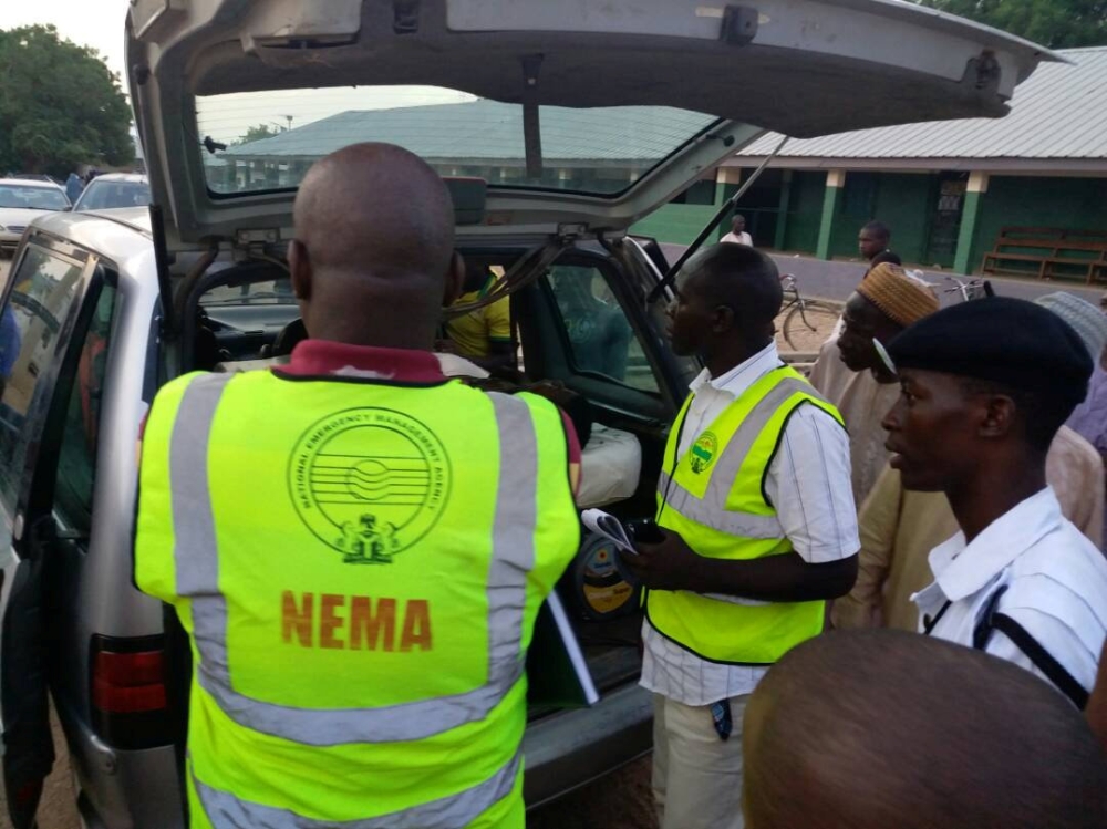 Members of the National Emergency Management Agency (NEMA) evacuate casualties from the site of blasts attack in Mubi, in northeast Nigeria, on Tuesday. — Reuters