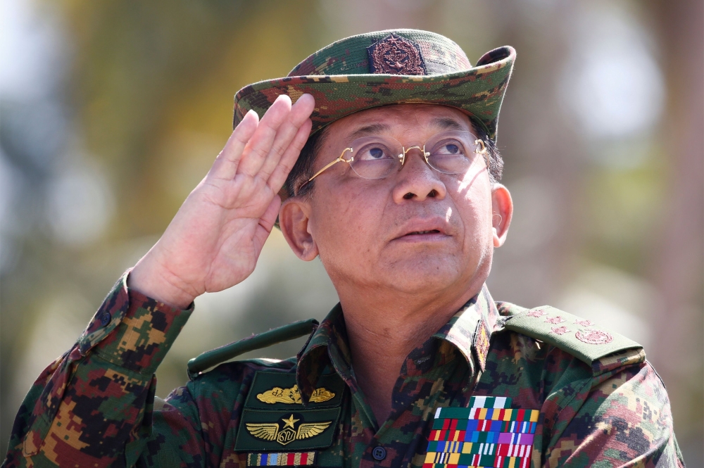 Myanmar military commander-in-chief Senior General Min Aung Hlaing salutes while speaking during the second day of ‘Sin Phyu Shin’ joint military exercises in the Ayeyarwaddy delta region in this Feb. 3, 2018 file photo. — AFP