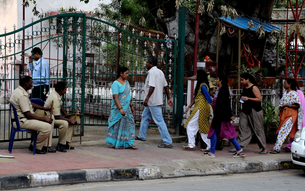 Indian voters walks down to cast their votes at a polling station during the Karnataka assembly elections in Bangalore, India, on Saturday. — EPA