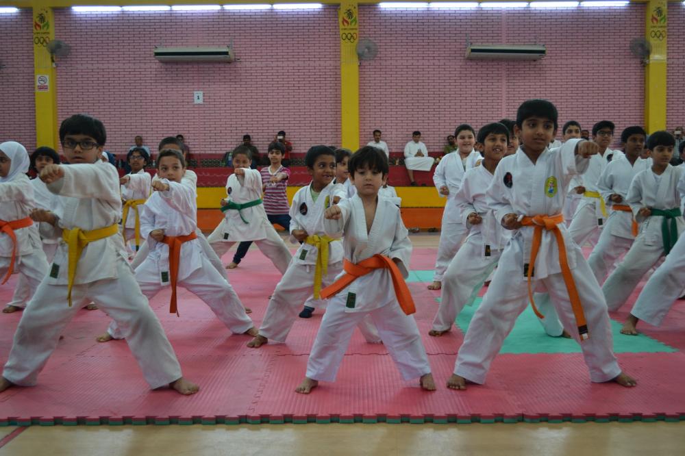 Karatekas perform during annual celebrations.