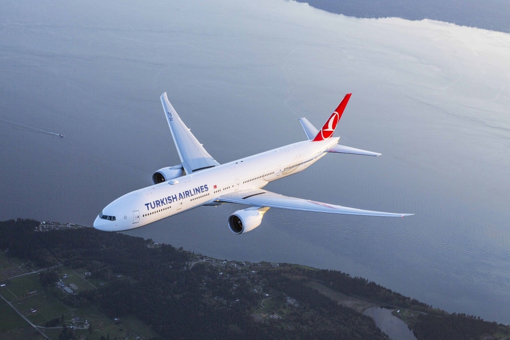 Turkish Airlines Boeing 777-300ER photographed on 6 April 2015 from Wolfe Air Aviation Learjet 25B by Chad Slattery.