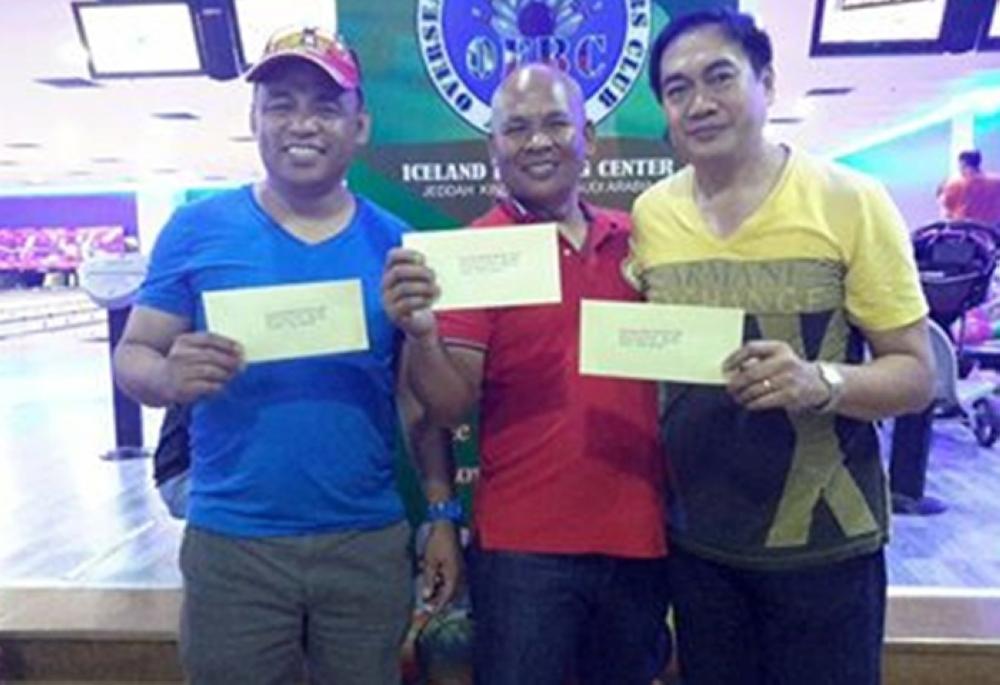 Men’s division winners, from left, Cesar Pagtalunan, Alexander Duma and Nap Patayan. 