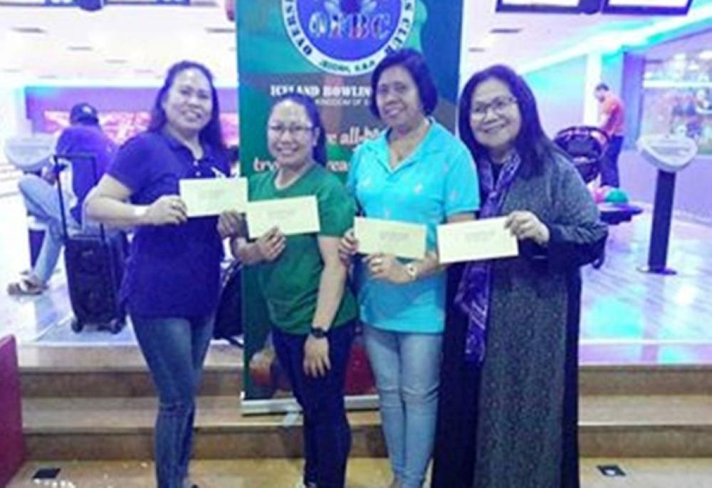 Men’s division winners, from left, Cesar Pagtalunan, Alexander Duma and Nap Patayan. 