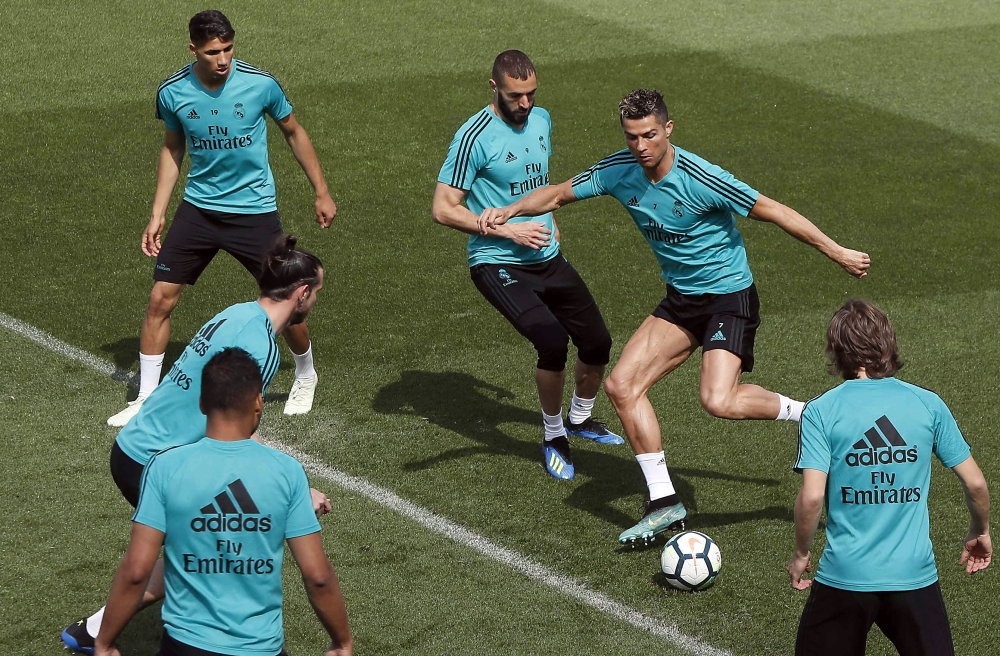 Real Madrid's Cristiano Ronaldo (2-R) attends a team's training session in Madrid, Spain, on Friday. Real Madrid will face Villarreal in their Spanish Primera Division Liga soccer match at Ceramica stadium in Villarreal on Saturday. — EPA