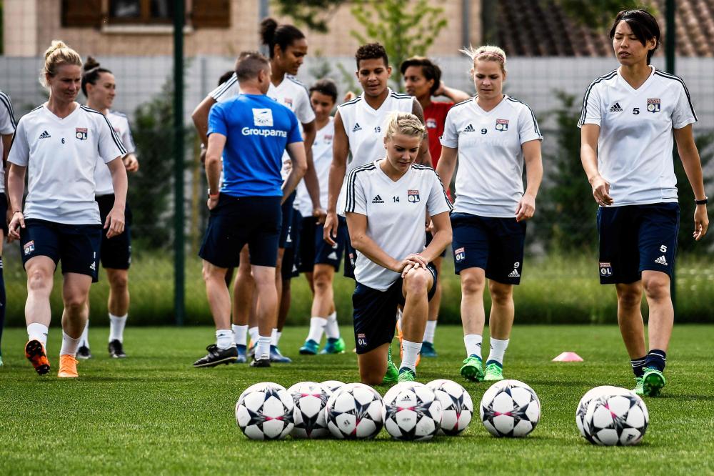 Olympique Lyonnais players take part in a training session in Lyon. — AFP 