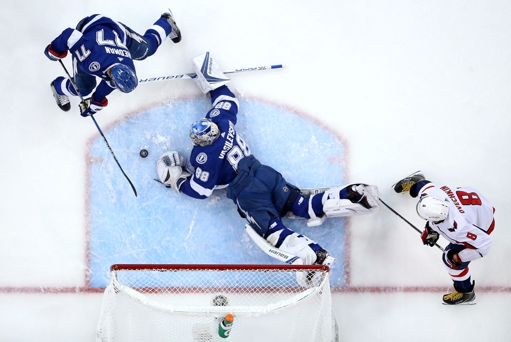 Andrei Vasilevskiy No. 88 of the Tampa Bay Lightning stops a shot from Alex Ovechkin No. 8 of the Washington Capitals in Game Seven of the Eastern Conference Finals during the 2018 NHL Stanley Cup Playoffs at Amalie Arena on May 23, 2018 in Tampa, Florida. — AFP