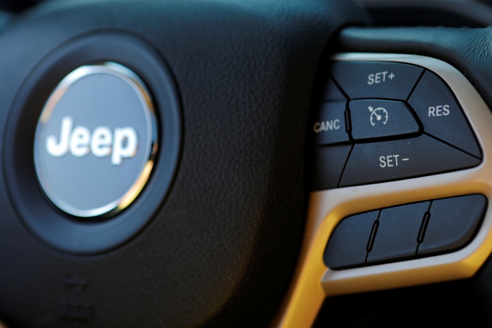 Cruise control on a 2017 Chrysler Jeep Cherokee is seen in a photo illustration in Medford, Massachusetts, US. — Reuters