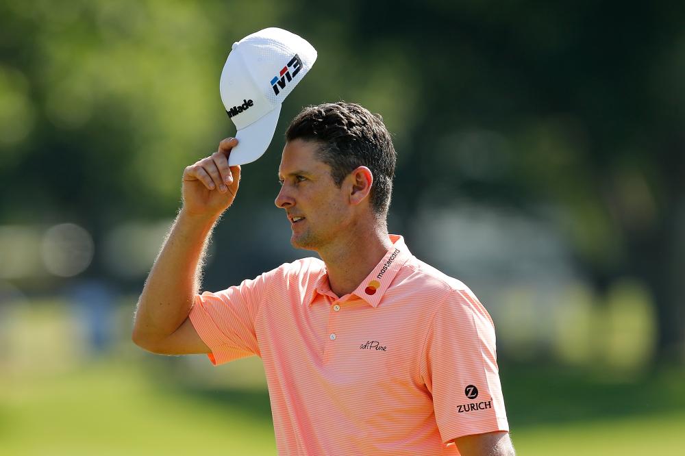 Justin Rose of England reacts after his putt on the 18th green during round three of the Fort Worth Invitational at Colonial Country Club in Fort Worth, Texas, Saturday. — AFP 