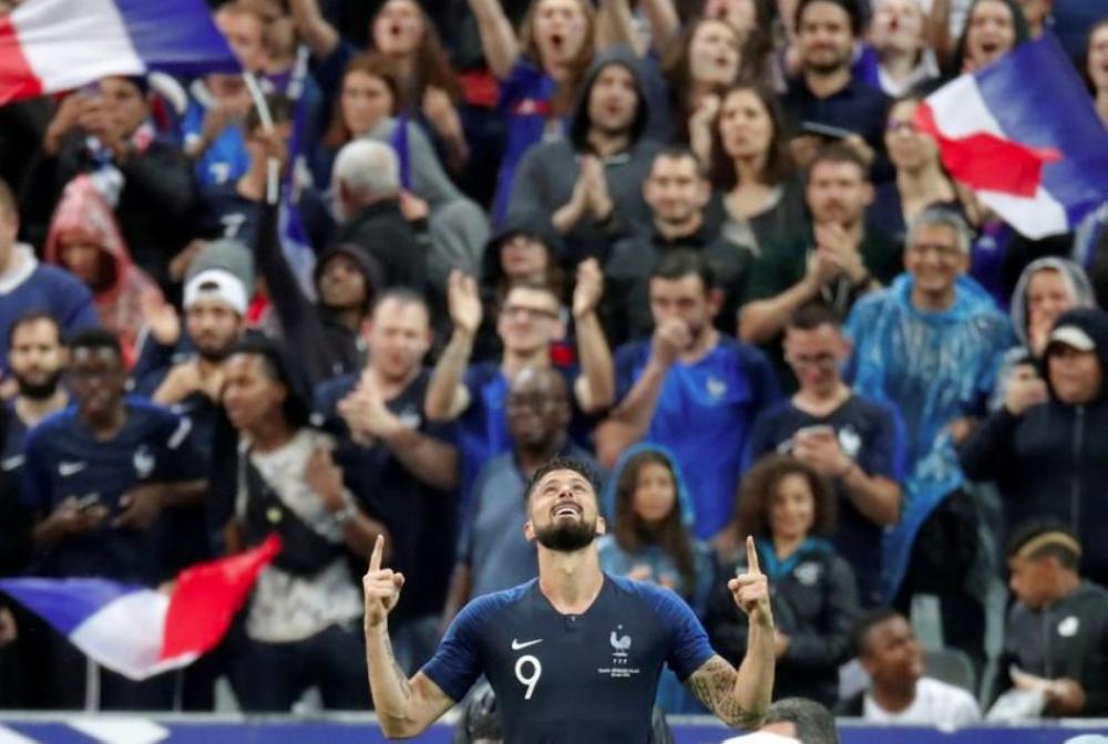 France’s Olivier Giroud celebrates scoring their first goal against Republic of Ireland during the International Friendly at the Stade de France, Paris, on Monday. — Reuters