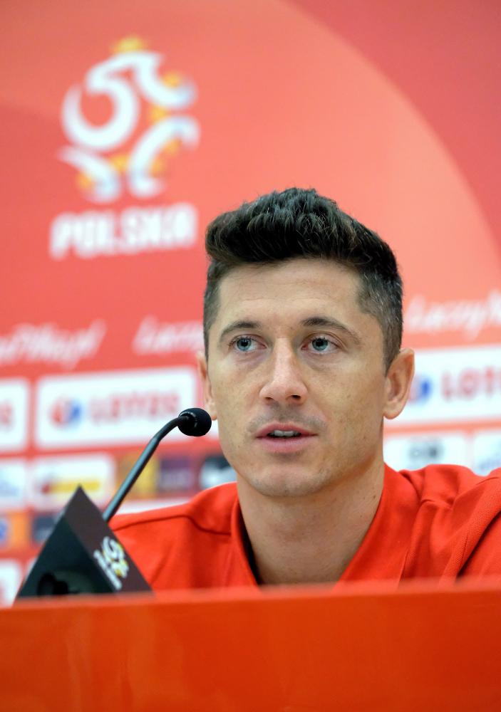 Poland's national football player Robert Lewandowski attends a press conference before the team's training camp in Arlamow, Poland, Wednesday. Poland prepares for the FIFA World Cup 2018 taking place in Russia on June 14. — EPA 