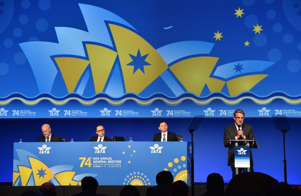 
International Air Transport Association (IATA) chief executive Alexandre de Juniac (right) speaks at the closing of the IATA annual meeting as Singapore Airlines chief executive Goh Choon Phong (2nd-R) and Qantas chief executive Alan Joyce (2nd-L) look on in Sydney on June 5, 2018. — AFP


