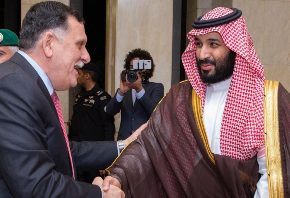 King, Crown Prince meet Libyan leader