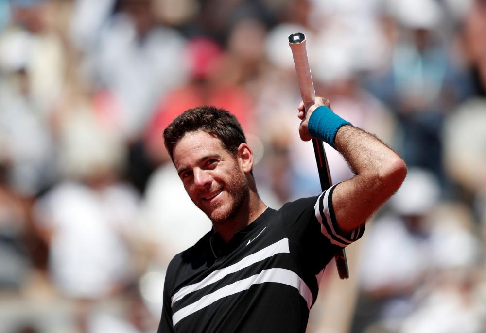 Spain’s Rafael Nadal celebrates after winning his quarterfinal against Argentina’s Diego Schwartzman at the French Open Tennis Tournament in Paris Thursday. — AFP