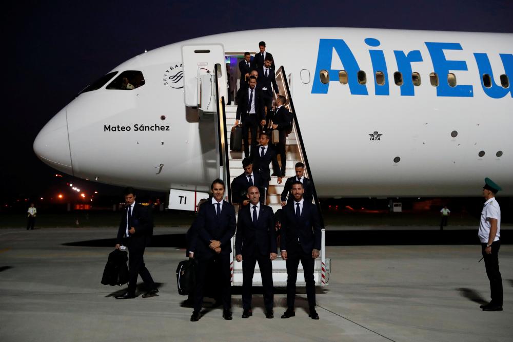 Spain's national soccer team arrives at Pashkovsky Airport, Krasnodar, Russia, Thursday. — Reuters