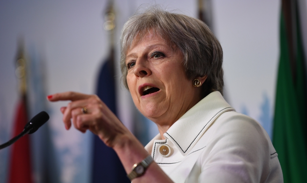 Britain’s Prime Minister Theresa May delivers her final press briefing at the G7 summit in Charlevoix in Canada on Saturday. — EPA