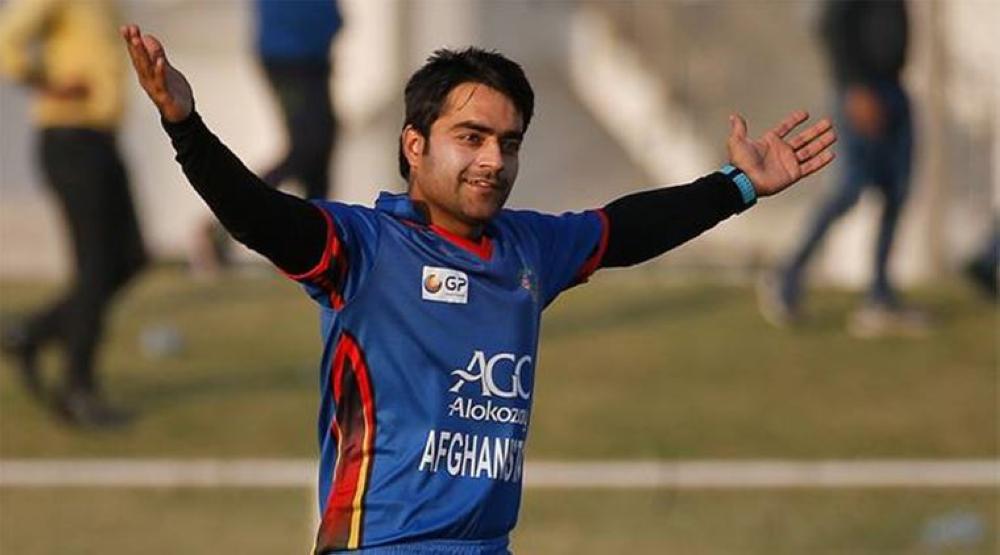 Rashid Khan of Afghanistan, seen in this file photo, is the toast of the cricket world with his leg-spin wizardry.