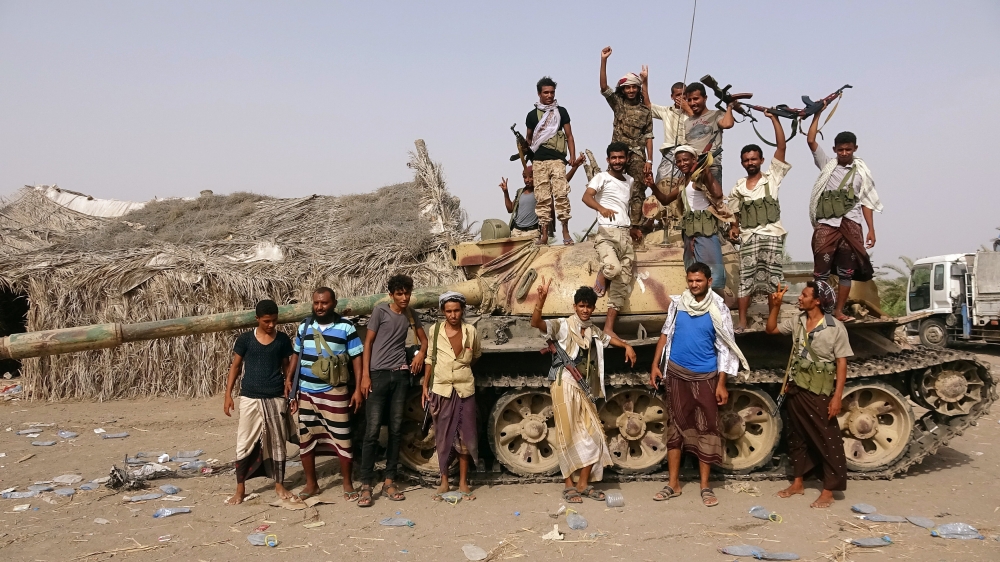 Tribal fighters loyal to the Yemeni government stand by a tank in Al-Faza area near Hodeida, Yemen, in this June 1, 2018 file photo. — Reuters