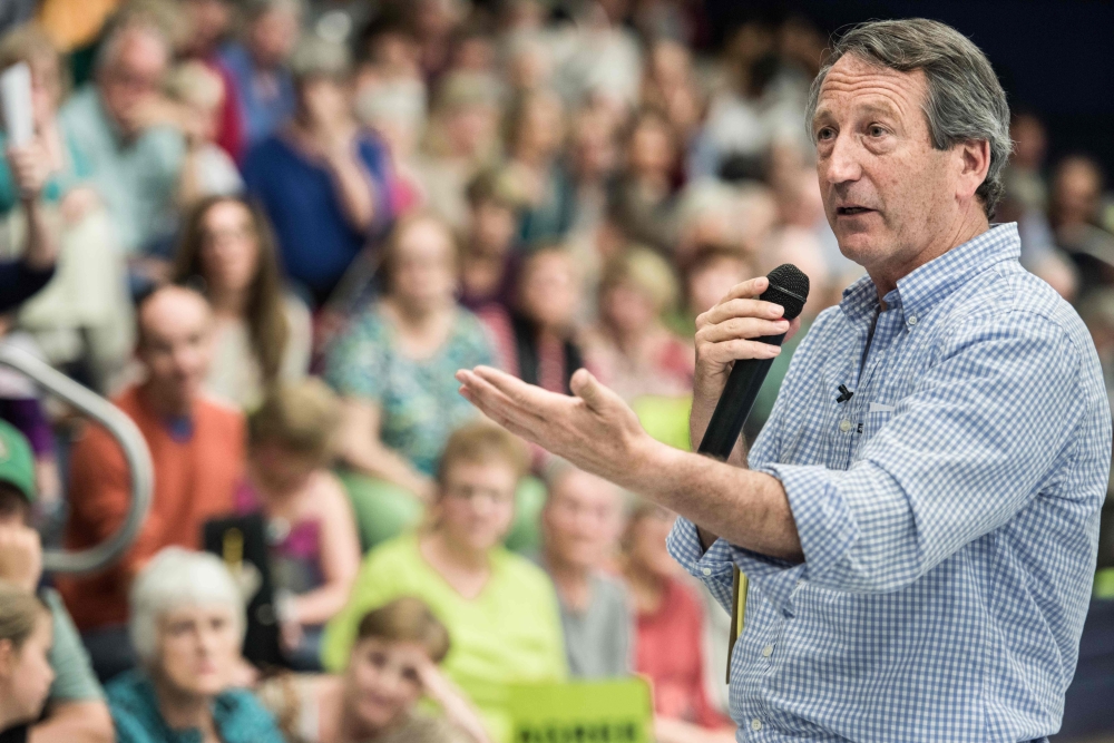Mark Sanford addresses the crowd during a town hall meeting in Hilton Head, South Carolina, in this March 18, 2017 file photo. — AFP