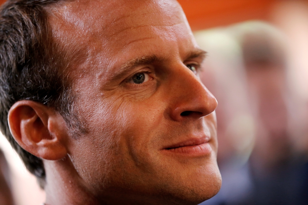 French President Emmanuel Macron attends a visit at the 721 Rochefort air base in Saint-Agnant, France, on Thursday. — Reuters