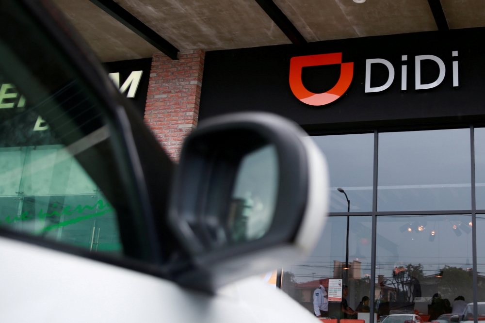 File photo shows the logo of Chinese ride-hailing firm Didi Chuxing is seen at their new drivers center in Toluca, Mexico. — Reuters