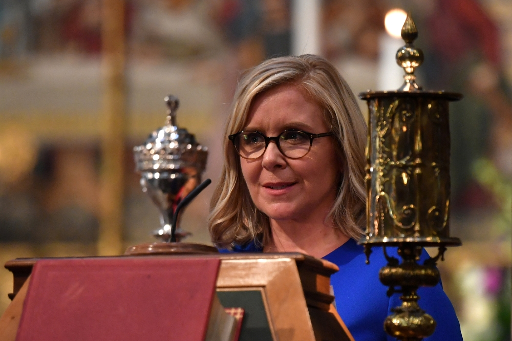 Lucy Hawking, daughter of Stephen Hawking, speaks at a memorial service for British scientist Stephen Hawking during which his ashes will be buried in the nave of the Abbey church at Westminster Abbey in London on Friday. — Reuters
