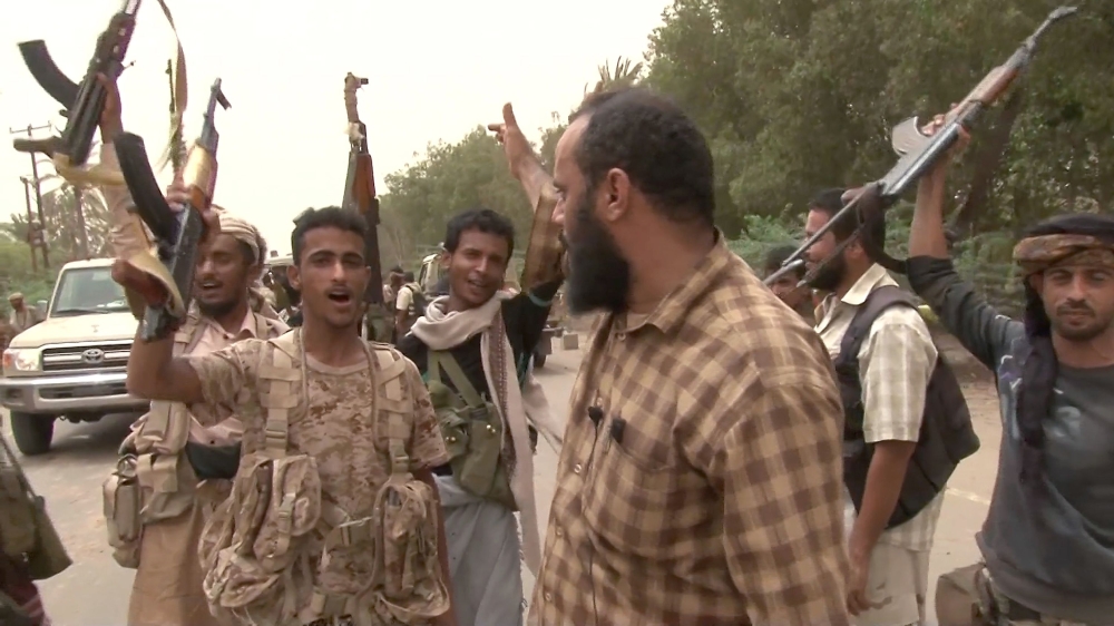 This image grab taken from a video shows Yemeni pro-government forces gathering at the south of Hodeida airport in Yemen’s Hodeida province on Friday. — AFP 