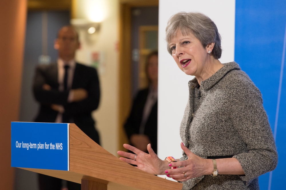 Britain’s Prime Minister Theresa May speaks at the Royal Free Hospital, London, on Monday. — Reuters