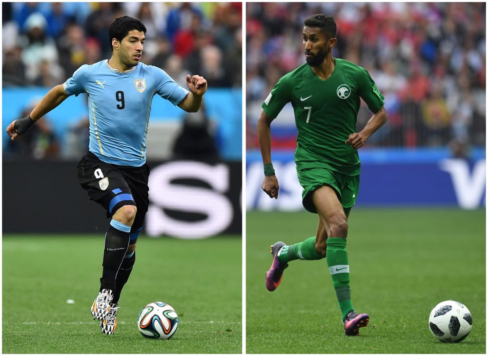 Uruguay's coach Oscar Tabarez (L) and Saudi Arabia's head coach Juan Antonio Pizzi . — AFP