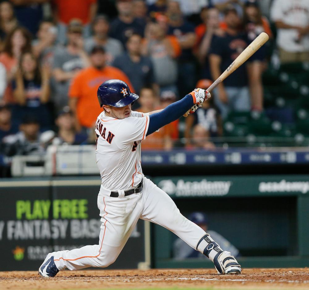 Alex Bregman of the Houston Astros hits a walkoff double in the ninth inning to give the Houston Astros a 5-4 win over the Tampa Bay Rays at Minute Maid Park in Houston, Texas, Monday. — AFP 