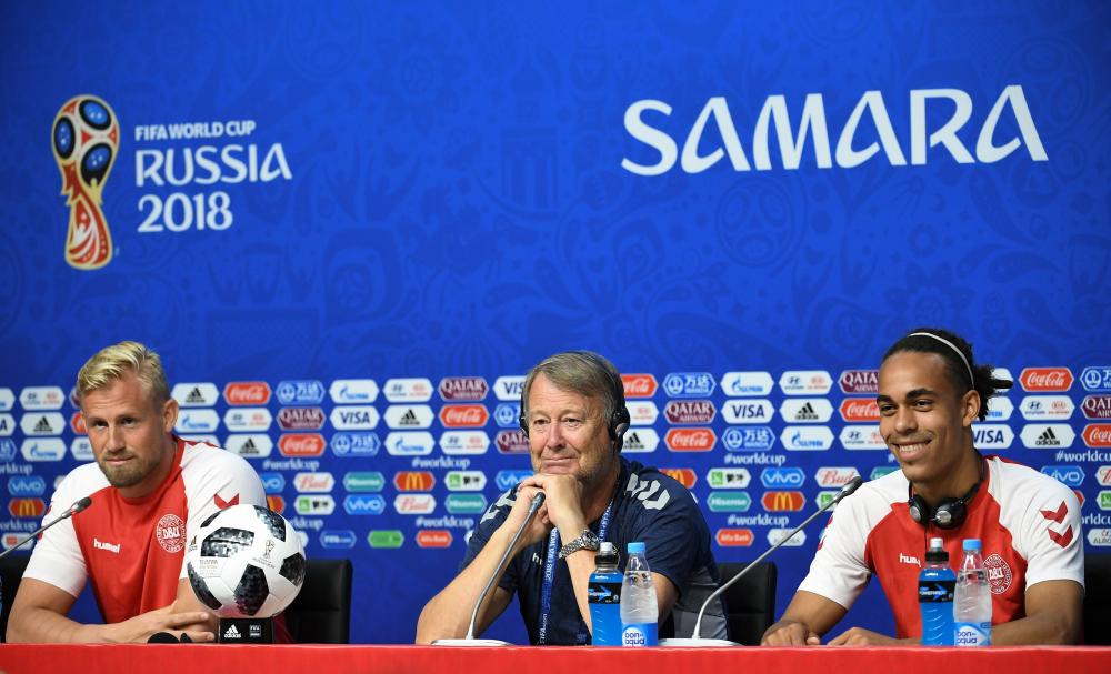 (From L) Denmark’s goalkeeper Kasper Schmeichel, coach Age Hareide and forward Yussuf Poulsen give a press conference at the Samara Arena in Samara Wednesday. — AFP 